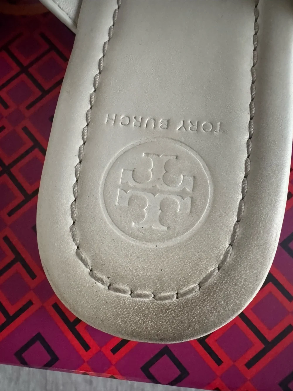 Tory Burch White Leather Thong Sandals with Gold Chain Accent